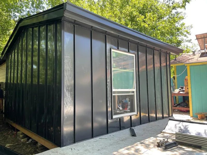 Black standing seam metal wall panels for Roof Inspection in Mount Vista