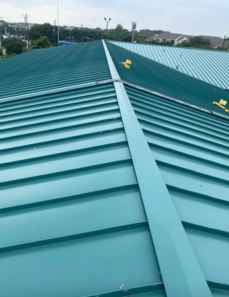 Green commercial metal roof ridge and valley for Metal Roof Repair in Mount Vista